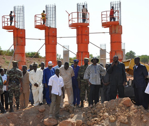 Inspection of the National Road 14: Luc Adolphe Tiao on a giant step-by-step construction site